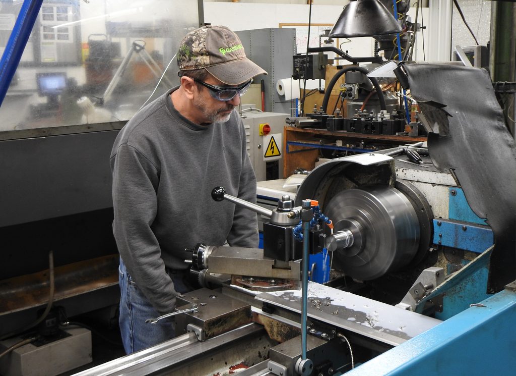 20-year Gasbarre employee Kevin Rollins turning down a punch at one of our Manual Lathes